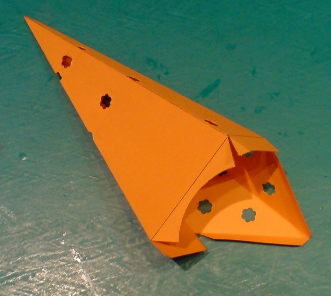 9. das Zusammenkleben der Spitze